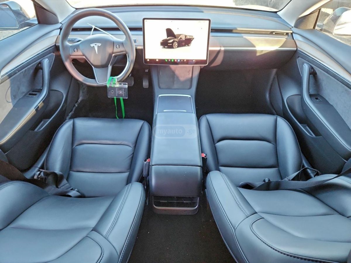Tesla Model 3 - фото 7