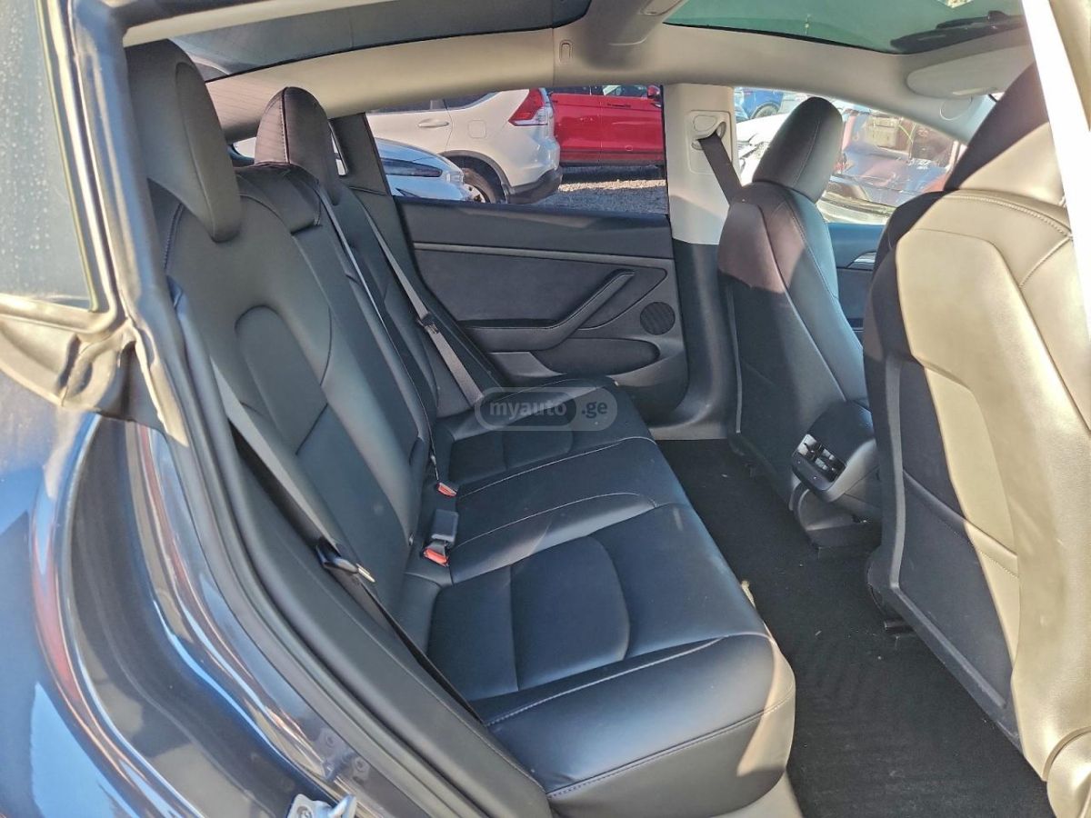 Tesla Model 3 - фото 9