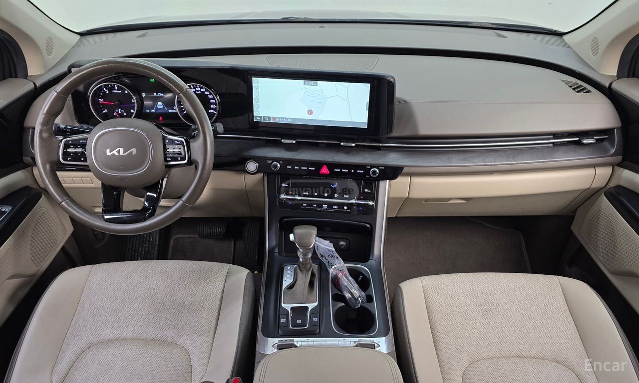 Kia Carnival - фото 7
