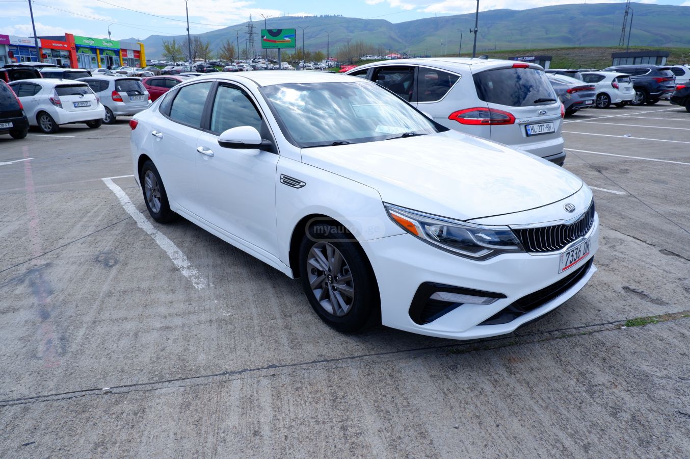 Kia Optima - фото 3