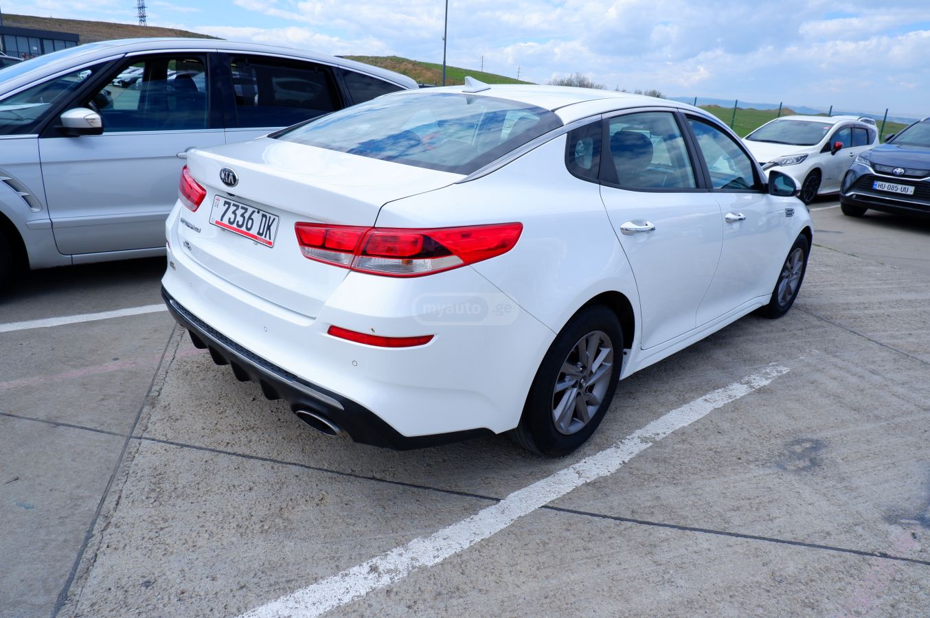 Kia Optima - фото 5