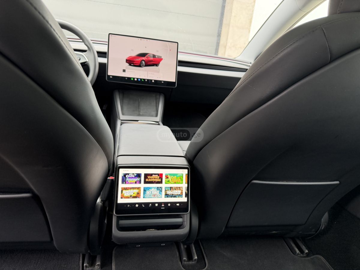 Tesla Model 3 - фото 6