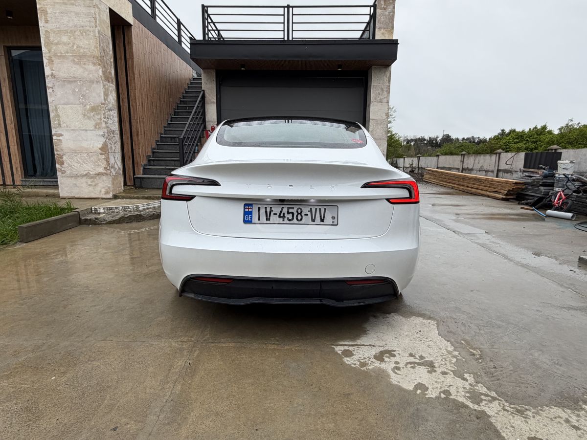 Tesla Model 3 - фото 9