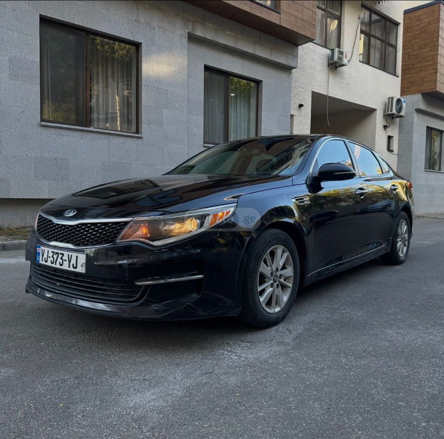 Kia Optima - фото 1