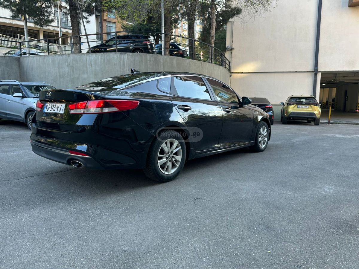 Kia Optima - фото 4