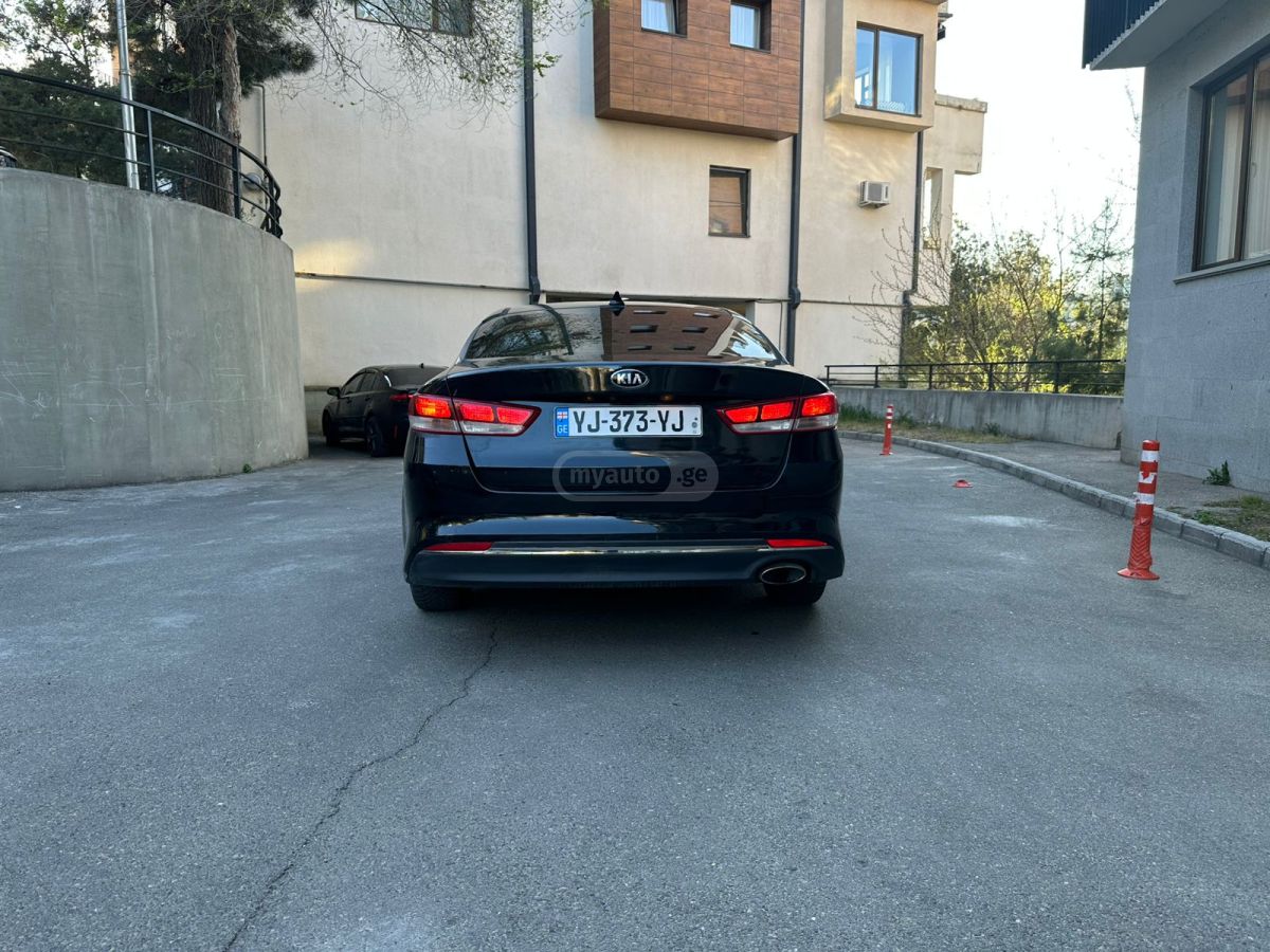 Kia Optima - фото 5