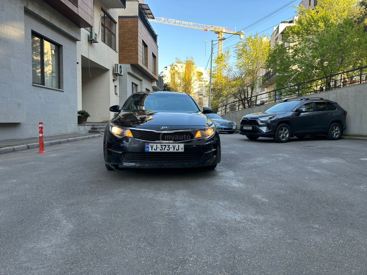 Kia Optima - фото 6