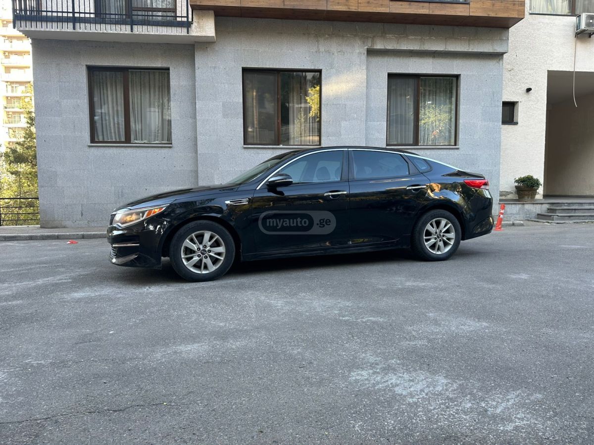 Kia Optima - фото 7