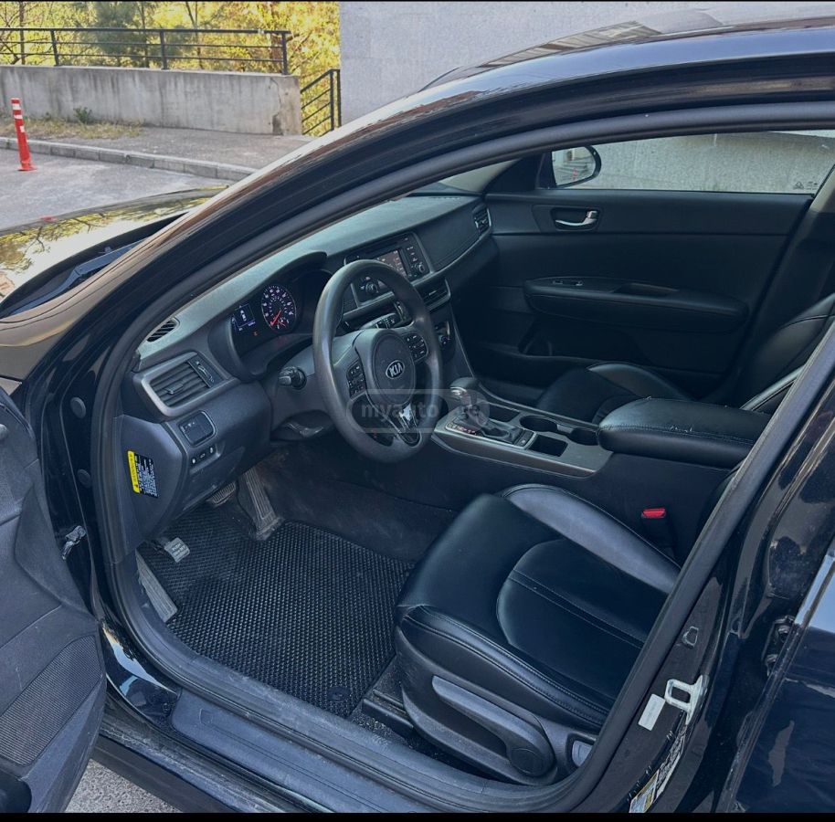 Kia Optima - фото 8