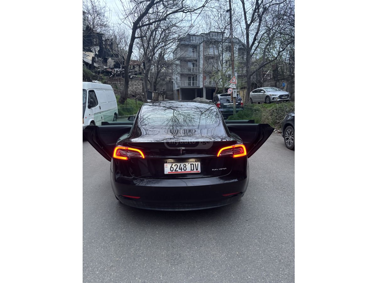Tesla Model 3 - фото 7