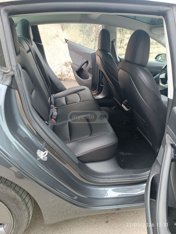 Tesla Model 3 - фото 12
