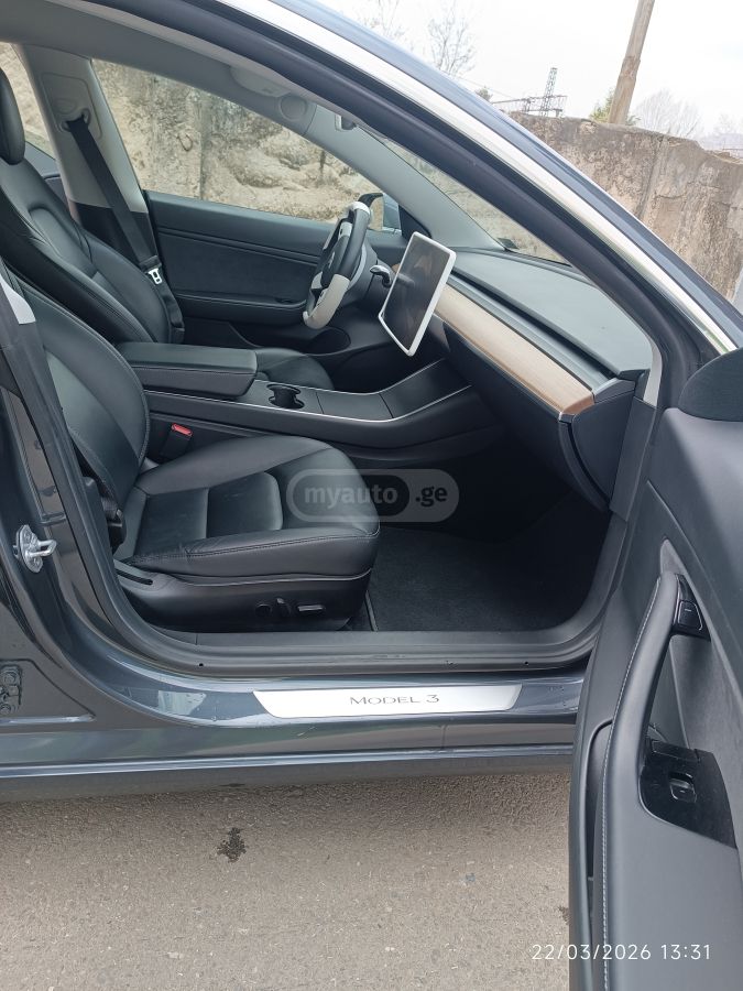 Tesla Model 3 - фото 13