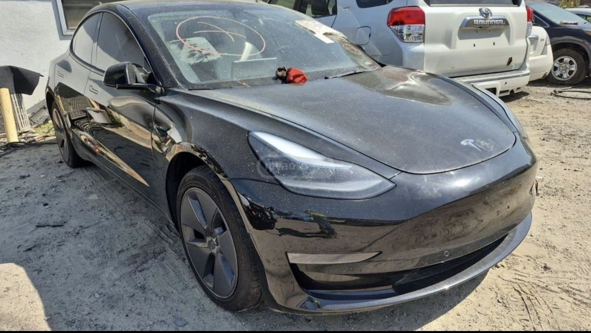 Tesla Model 3 - фото 9