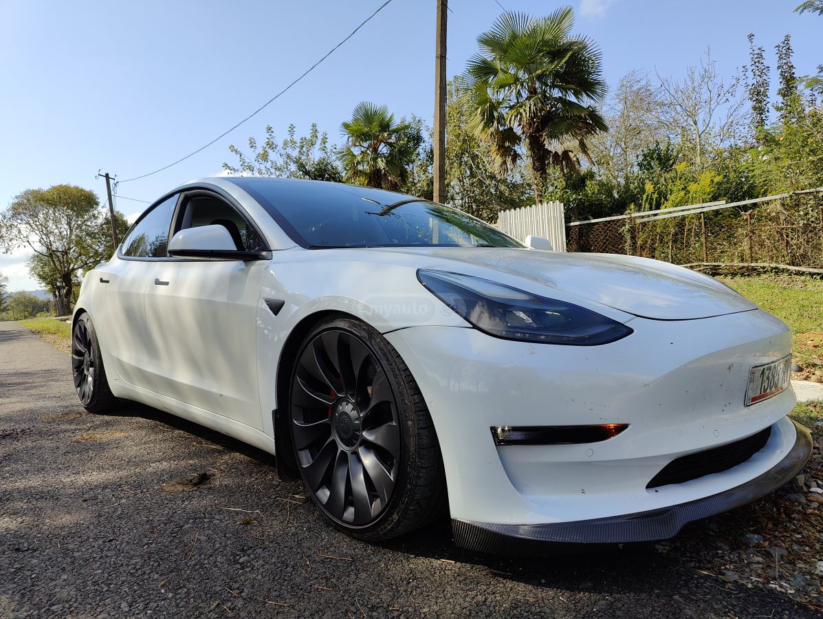 Tesla Model 3 - фото 8