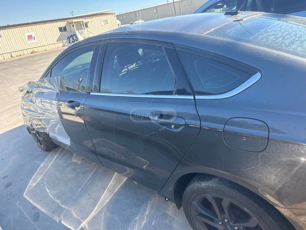 Ford Fusion - фото 7