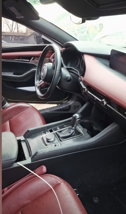 Mazda Mazda 3 - фото 9