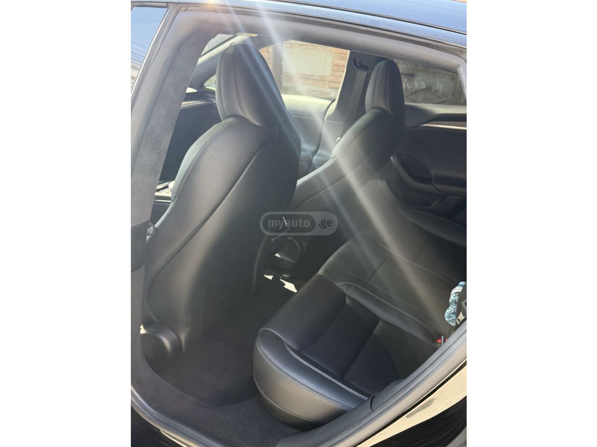 Tesla Model S - фото 7