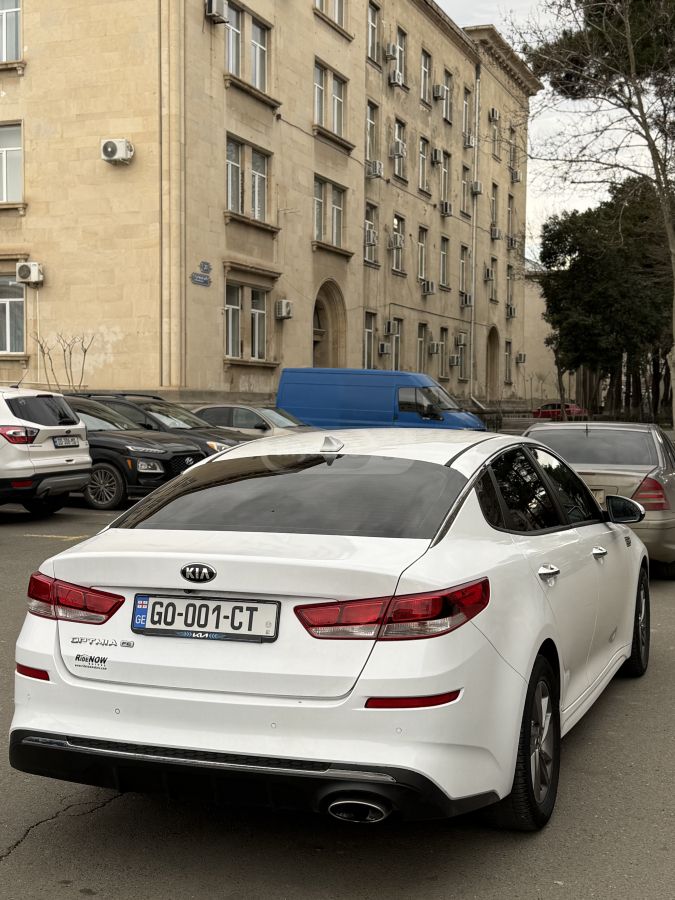 Kia Optima - фото 4