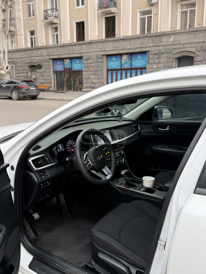 Kia Optima - фото 5
