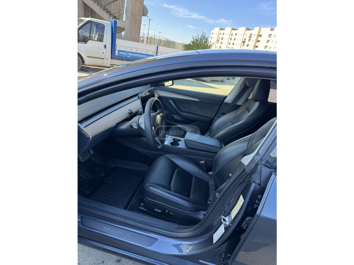 Tesla Model 3 - фото 5