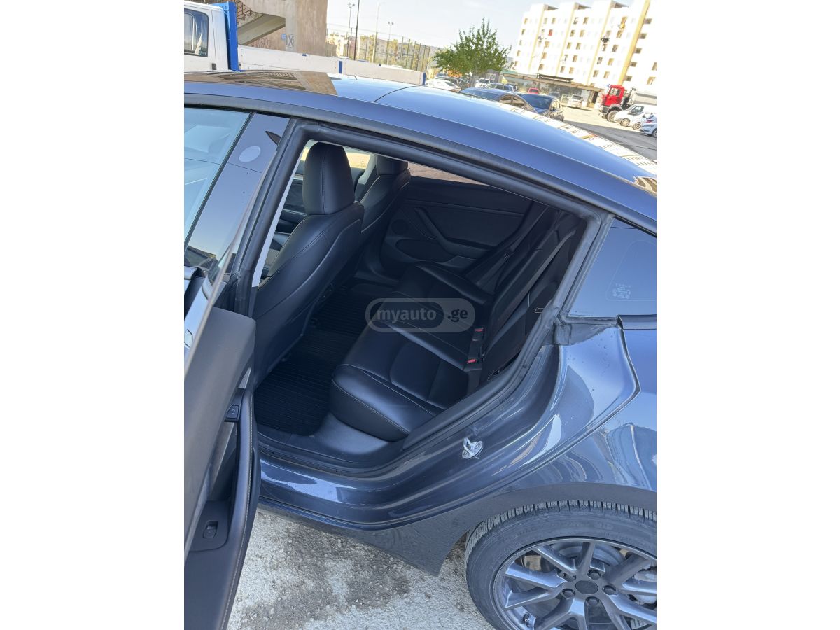 Tesla Model 3 - фото 6