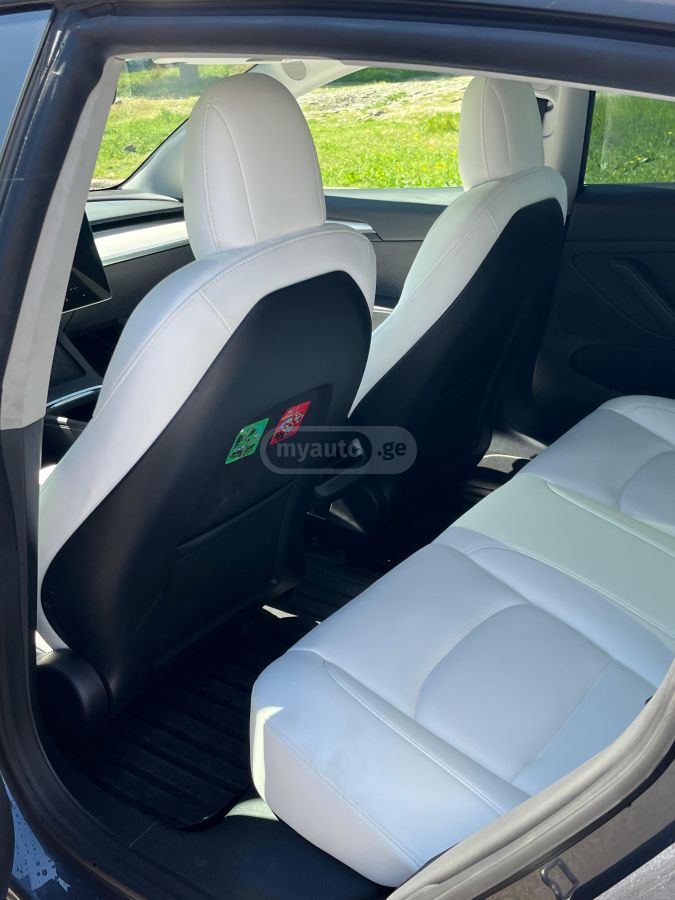 Tesla Model 3 - фото 6