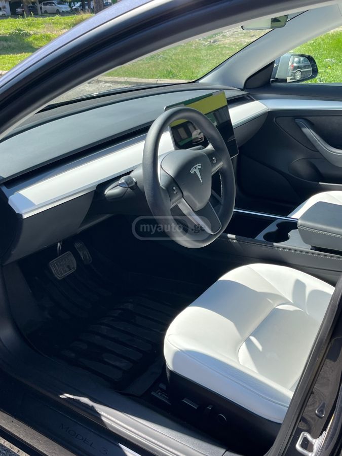 Tesla Model 3 - фото 7