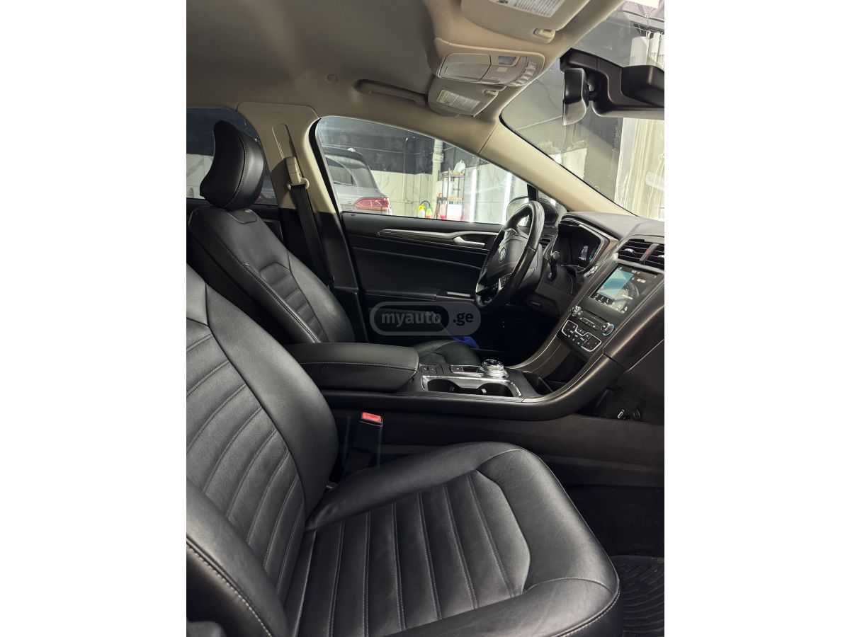 Ford Fusion - фото 7