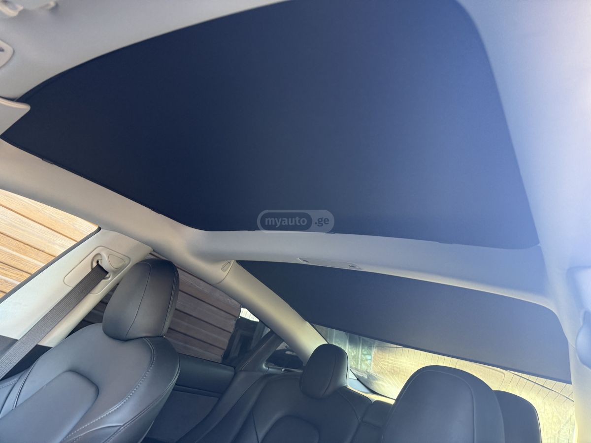 Tesla Model 3 - фото 8