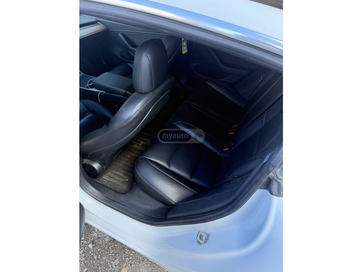 Tesla Model 3 - фото 9