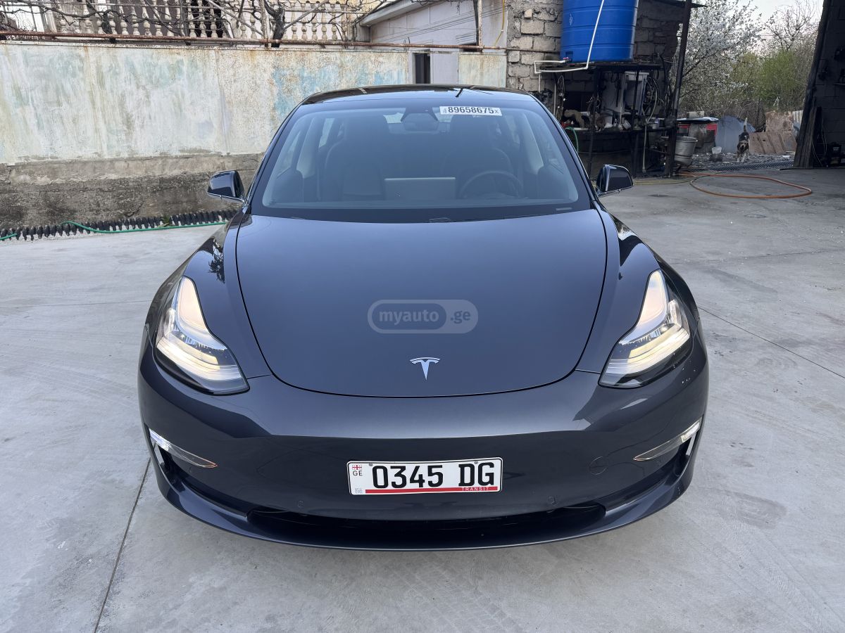 Tesla Model 3 - фото 1