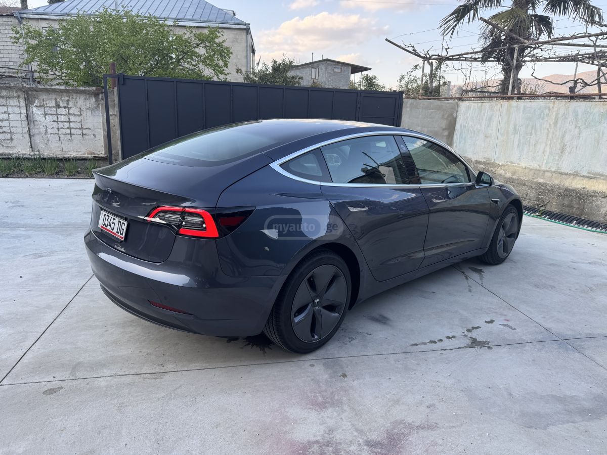 Tesla Model 3 - фото 11