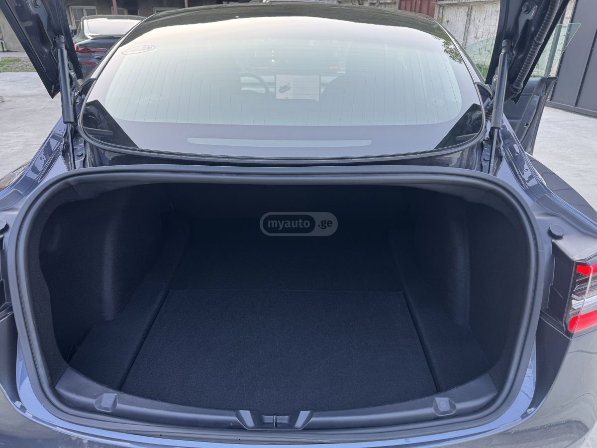 Tesla Model 3 - фото 12