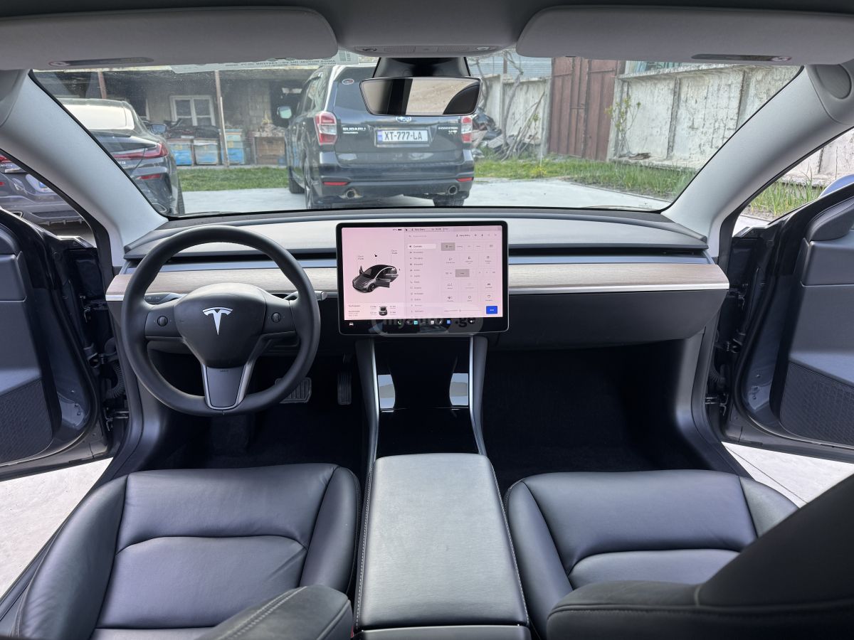 Tesla Model 3 - фото 13