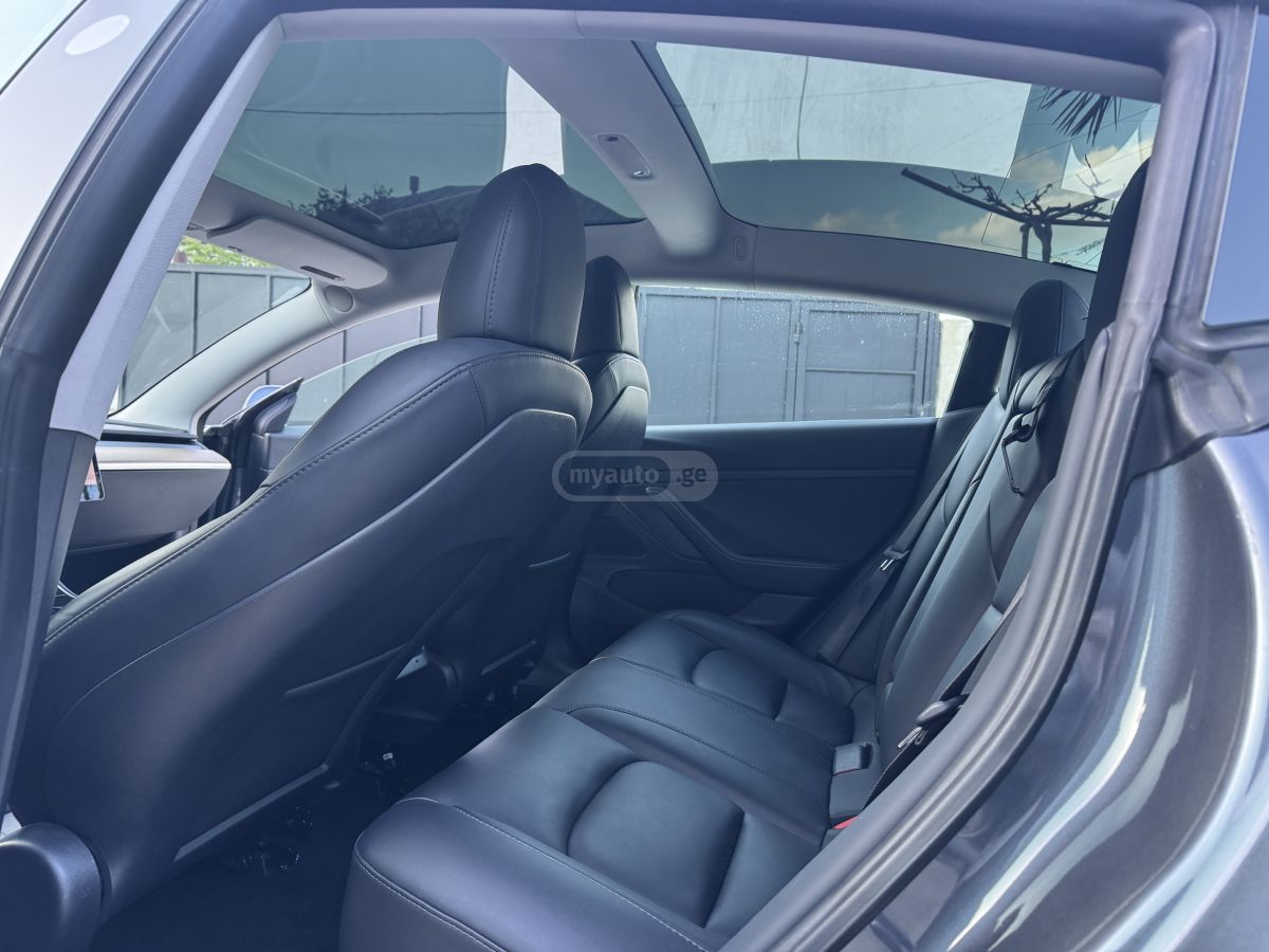 Tesla Model 3 - фото 14