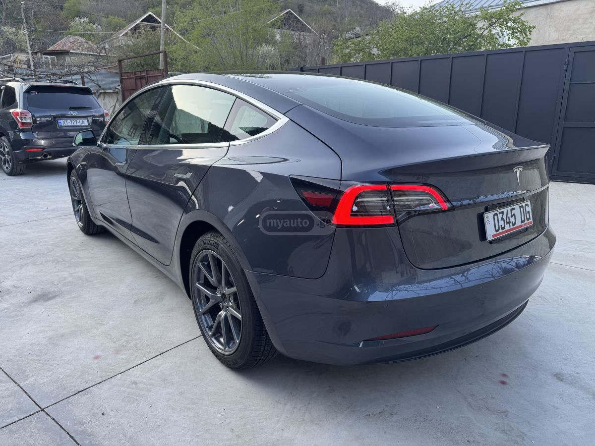 Tesla Model 3 - фото 7