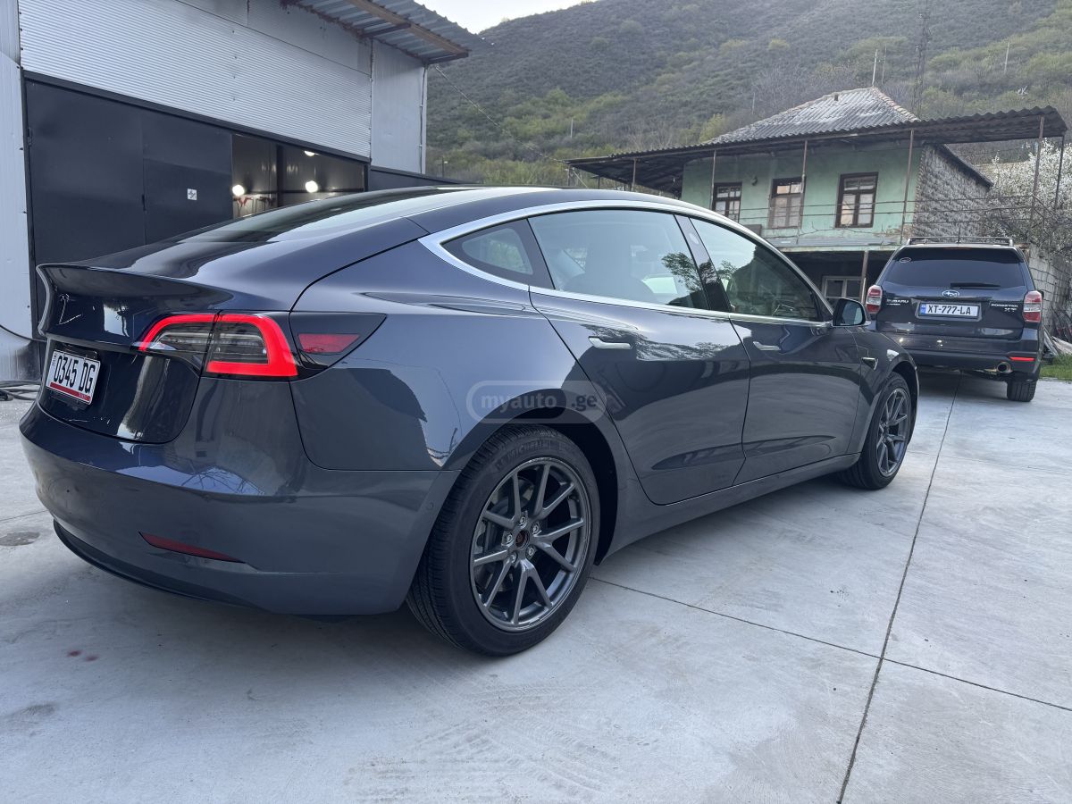 Tesla Model 3 - фото 8
