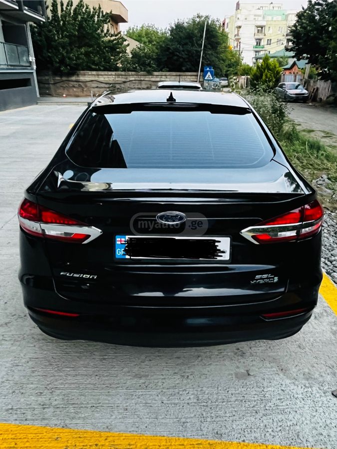 Ford Fusion - фото 8