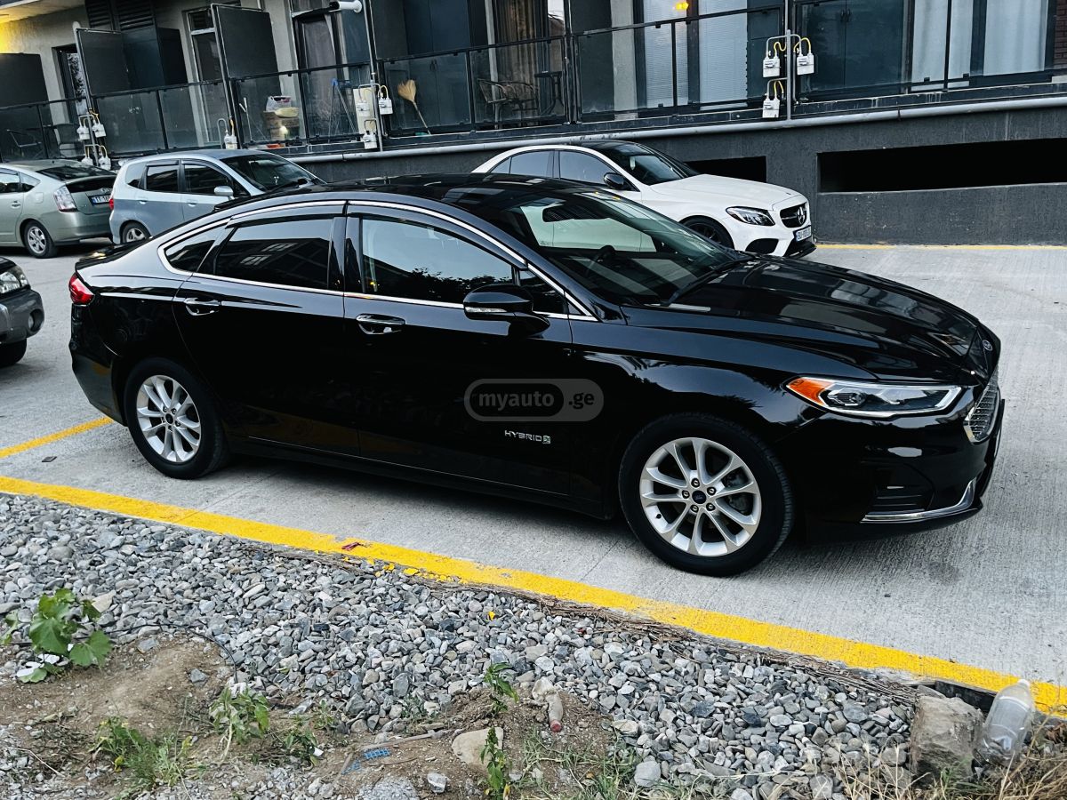 Ford Fusion - фото 9