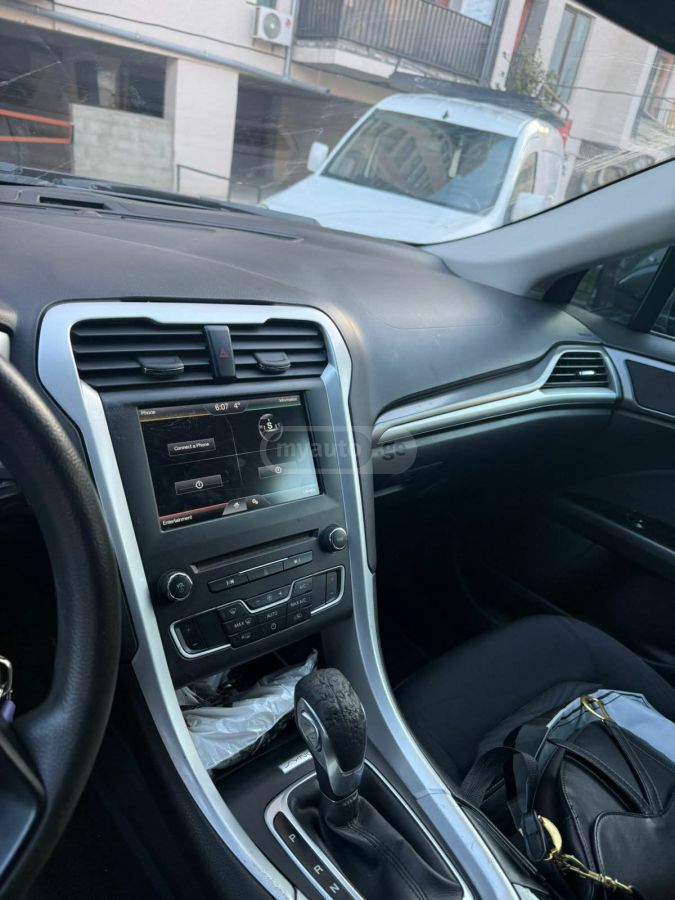 Ford Fusion - фото 7