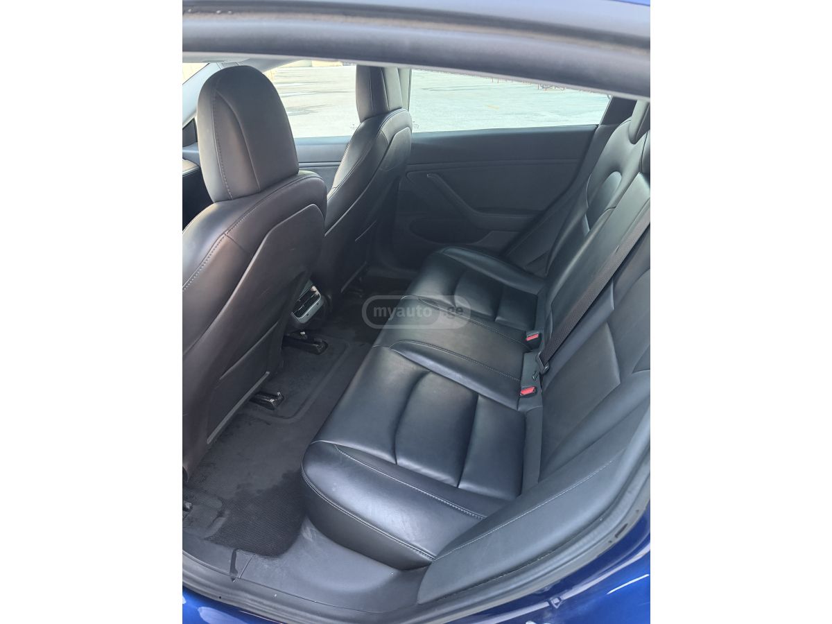 Tesla Model 3 - фото 8