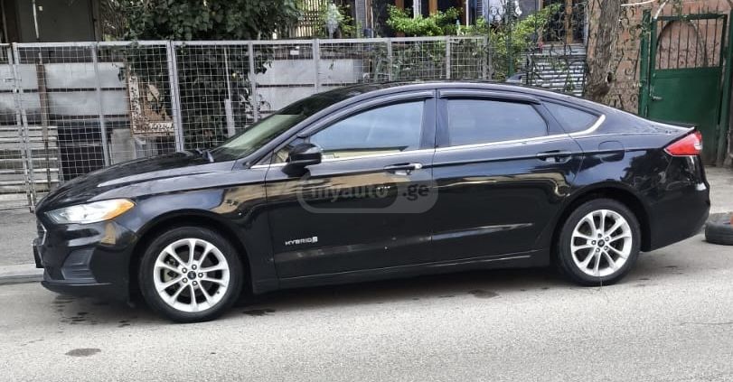 Ford Fusion - фото 10