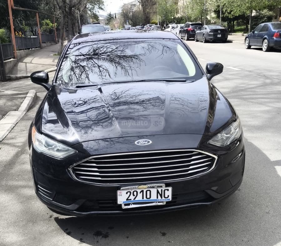 Ford Fusion - фото 7