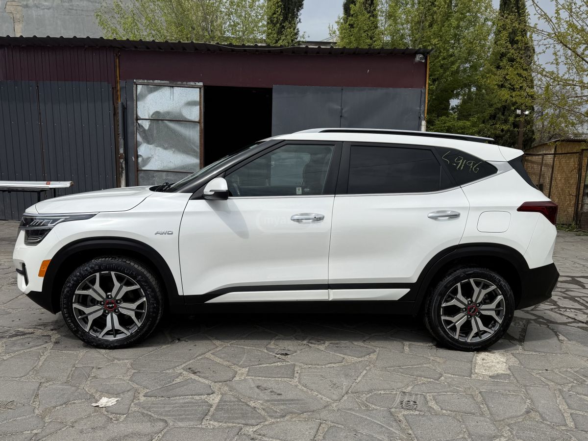 Kia Seltos - фото 12