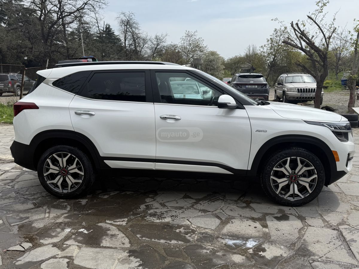 Kia Seltos - фото 9