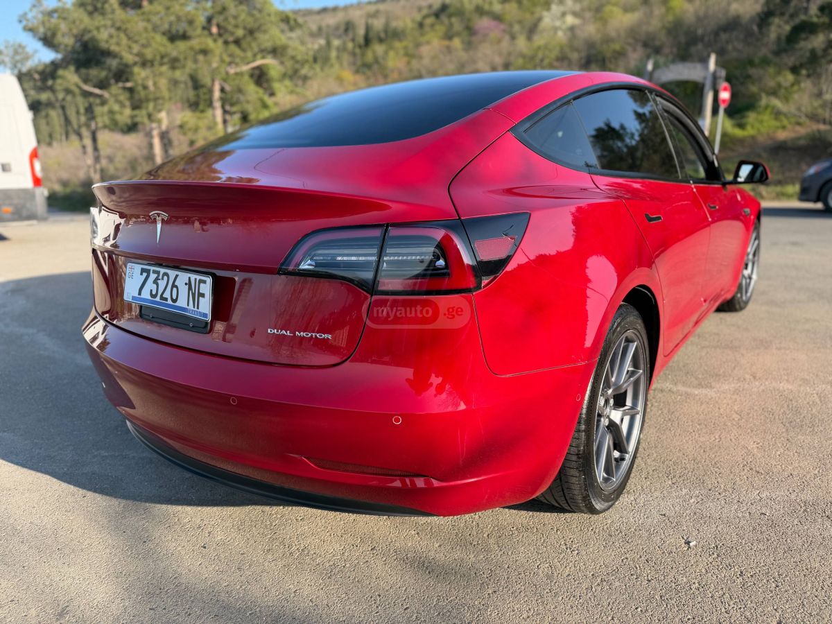 Tesla Model 3 - фото 7