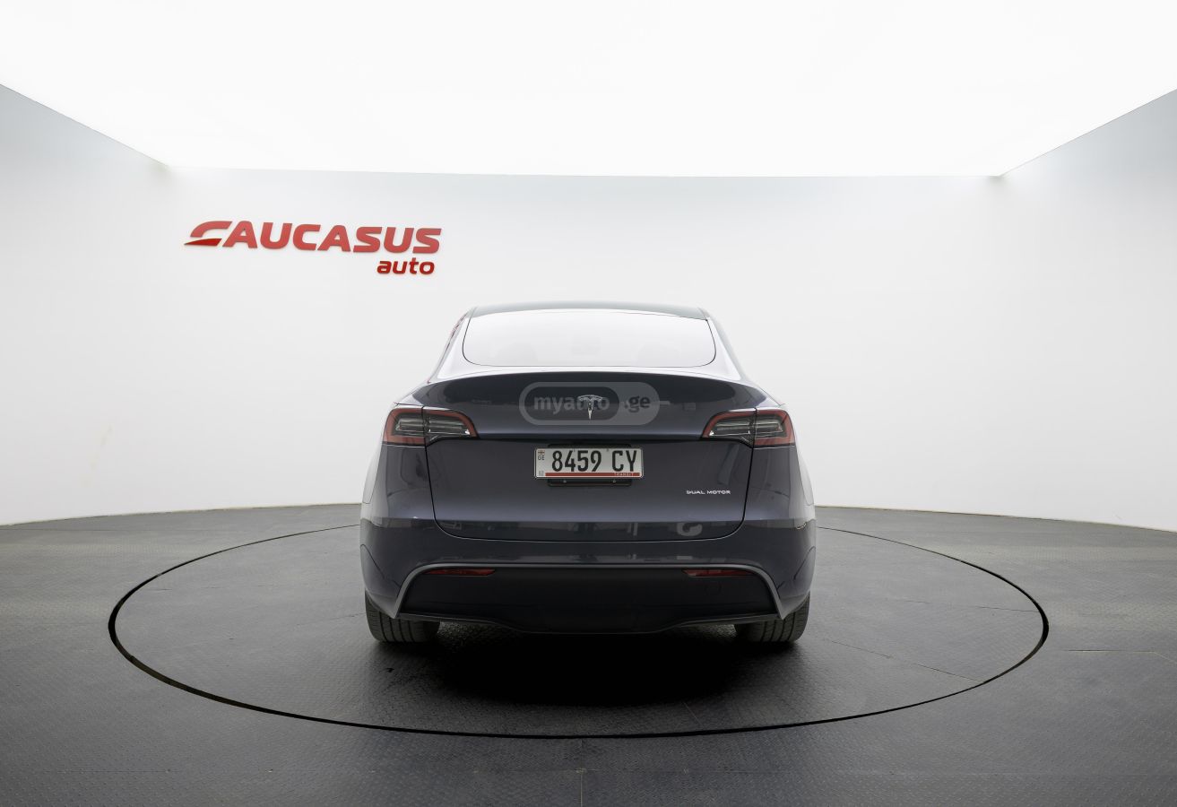 Tesla Model Y - фото 6