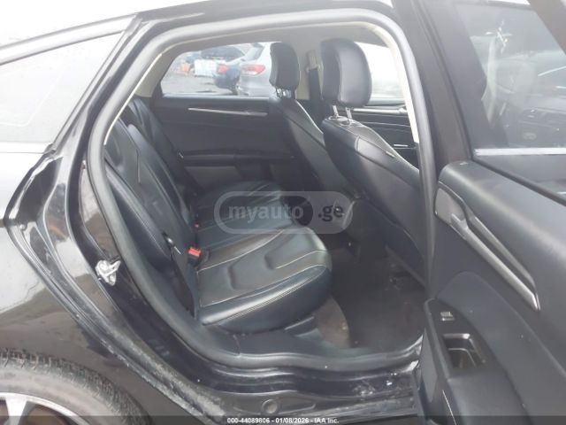 Ford Fusion - фото 9