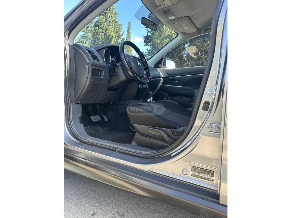 Mitsubishi Outlander Sport - фото 12