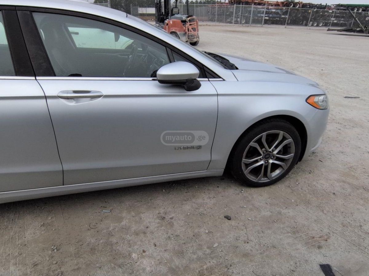 Ford Fusion - фото 8